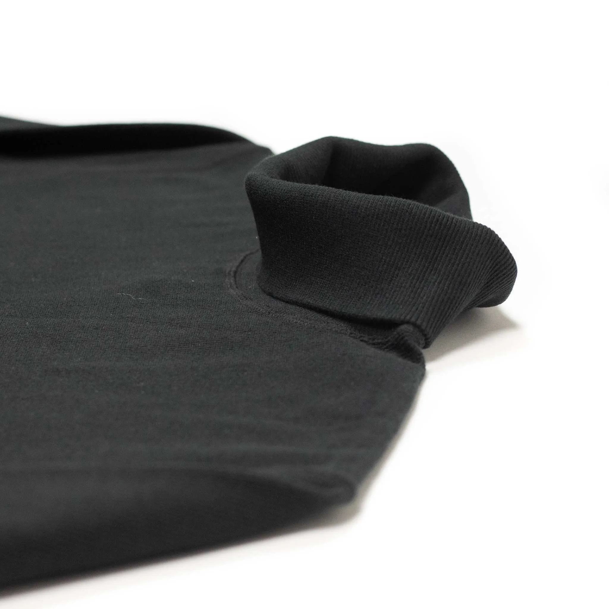 Rollneck t-shirt in black ribbed cotton jersey